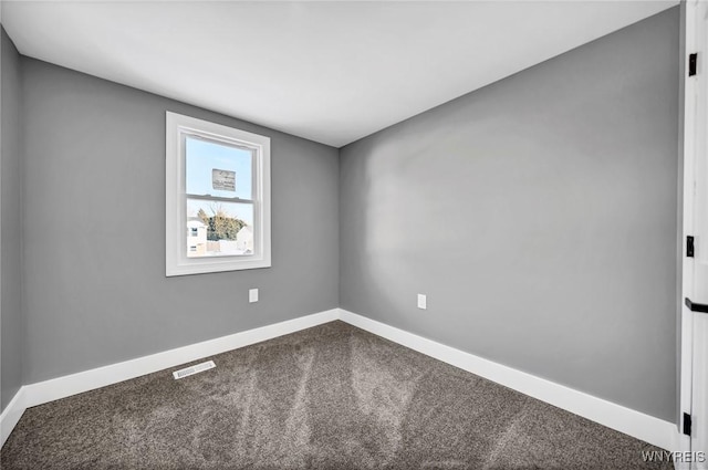 unfurnished room featuring carpet flooring