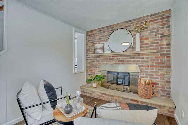 living room featuring hardwood / wood-style floors and a fireplace