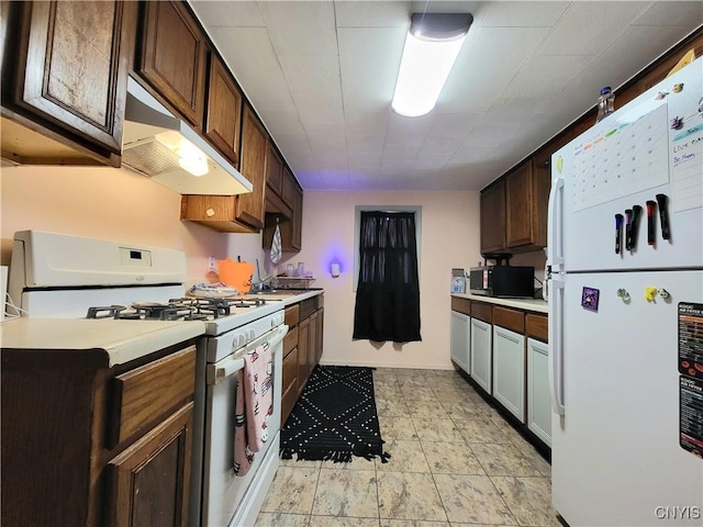 kitchen with white appliances and dark brown cabinets