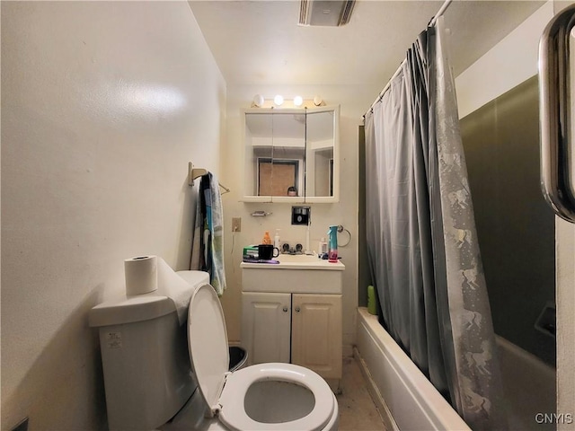 full bathroom with vanity, toilet, and shower / bath combo with shower curtain