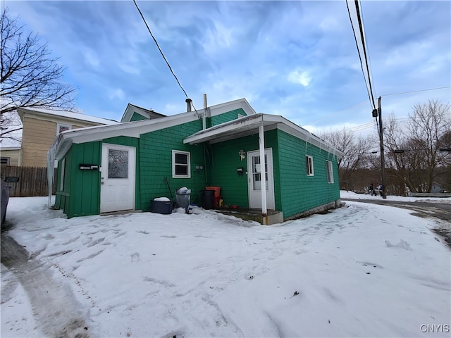 view of snow covered property