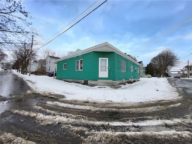 view of snow covered property