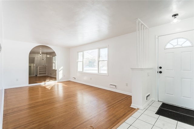 entryway featuring light tile patterned floors