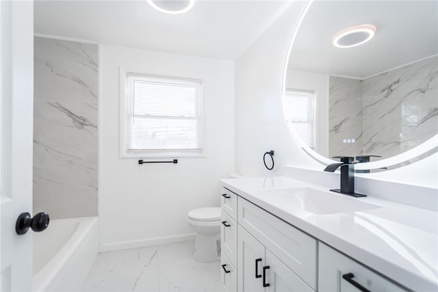 bathroom with vanity, a wealth of natural light, and toilet