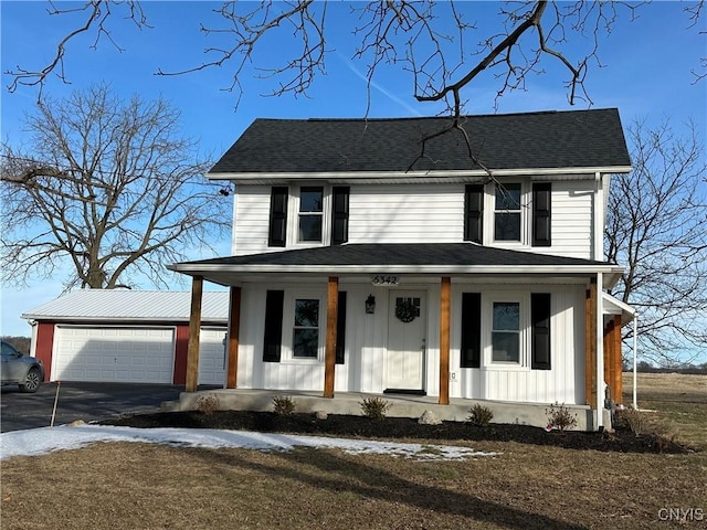 view of front of home with a garage and covered porch