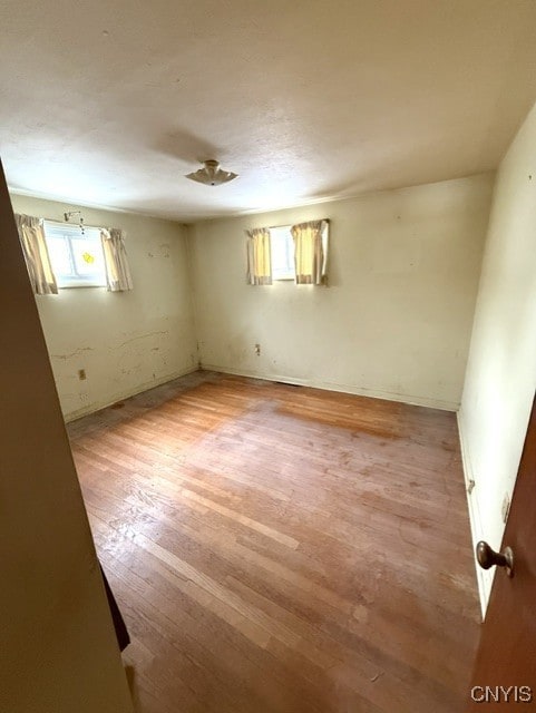 spare room featuring light hardwood / wood-style flooring