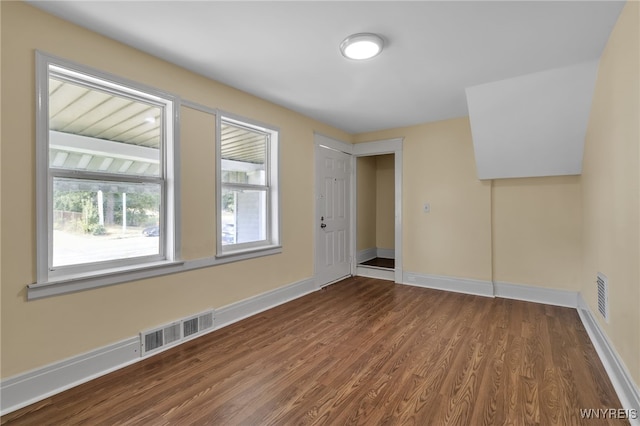 unfurnished room featuring wood-type flooring