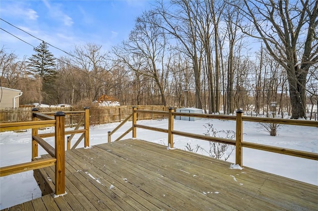 view of snow covered deck