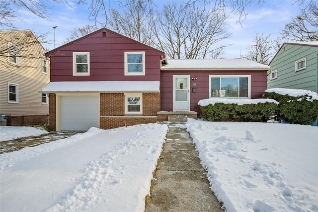 split level home with a garage