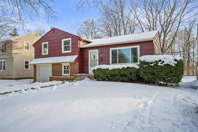 split level home featuring a garage