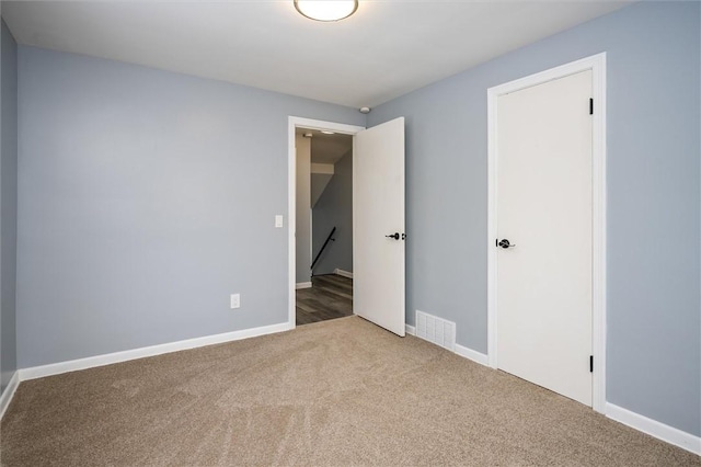 view of carpeted spare room