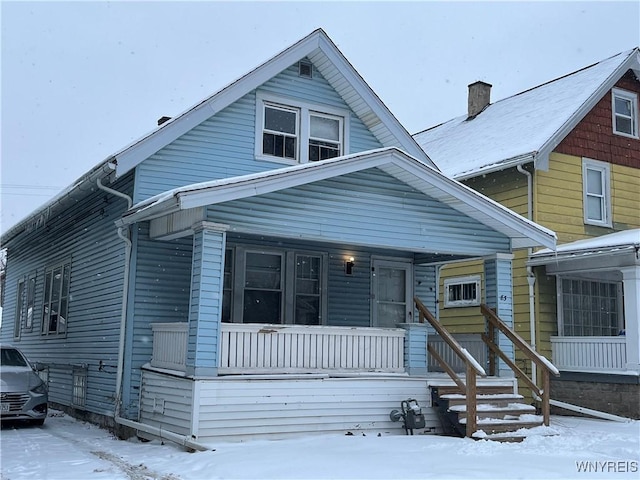 view of front of home featuring covered porch