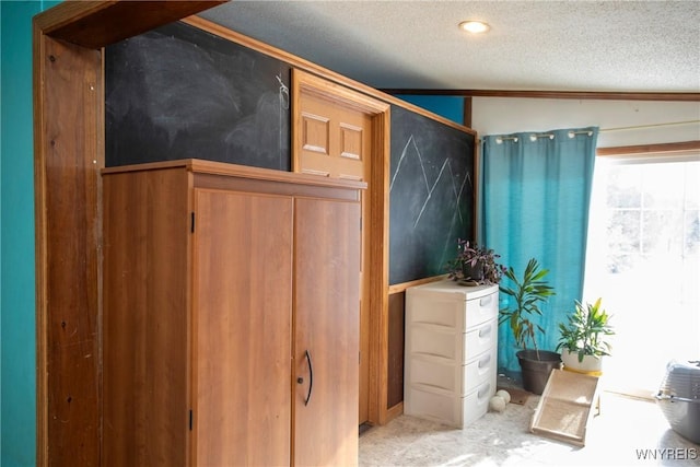 bathroom with a textured ceiling