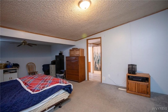 carpeted bedroom featuring lofted ceiling, crown molding, and a textured ceiling