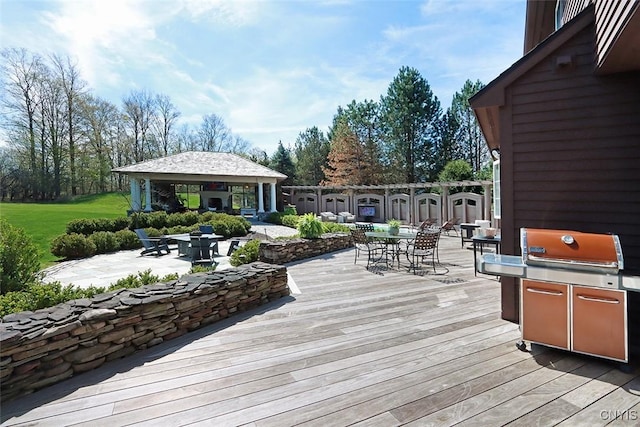 wooden deck featuring a gazebo