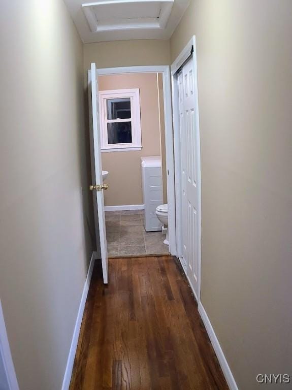 hallway featuring dark hardwood / wood-style floors