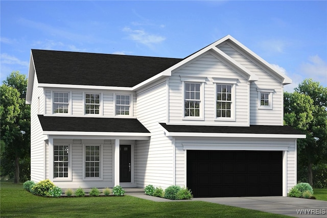 view of front facade featuring a garage and a front yard