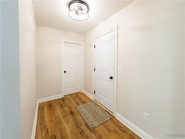 doorway to outside with light hardwood / wood-style flooring