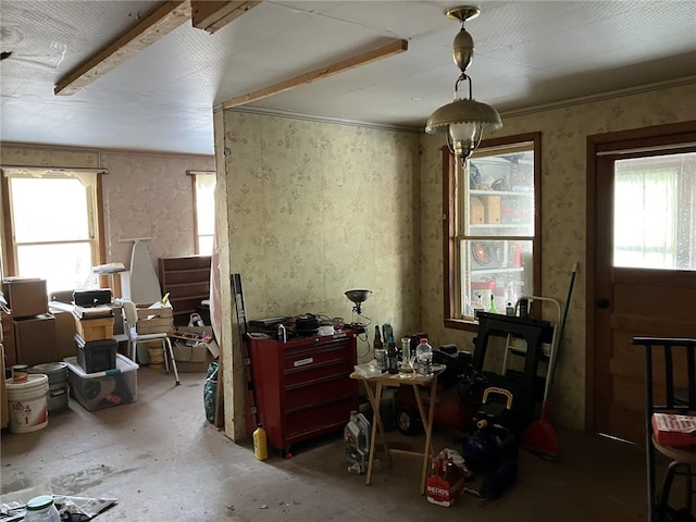 miscellaneous room with crown molding