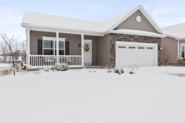 ranch-style house with a garage and covered porch