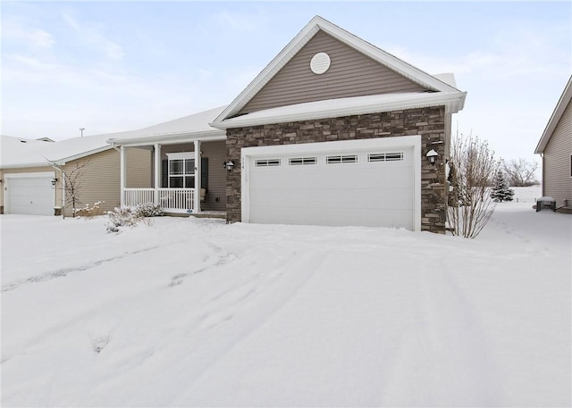 view of front of house with a garage and covered porch