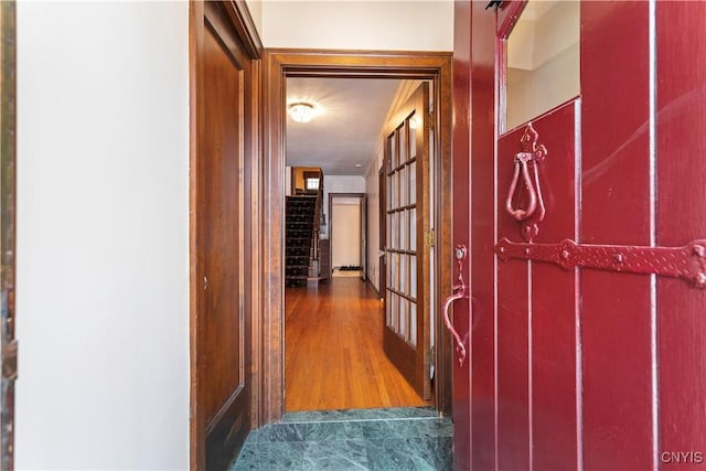 hallway featuring dark wood-type flooring