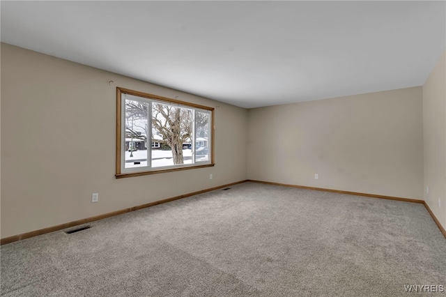 empty room with carpet flooring