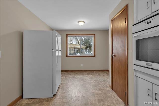 kitchen featuring white appliances