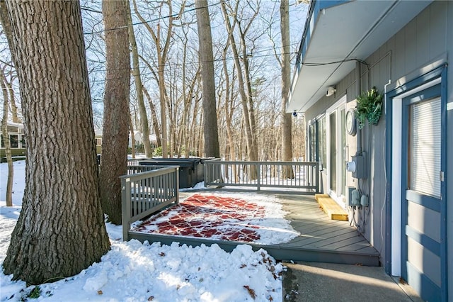 view of snow covered deck