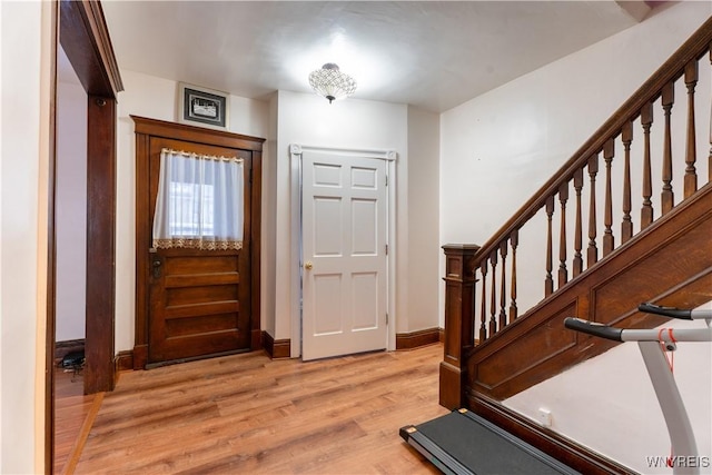 foyer entrance featuring light wood-type flooring