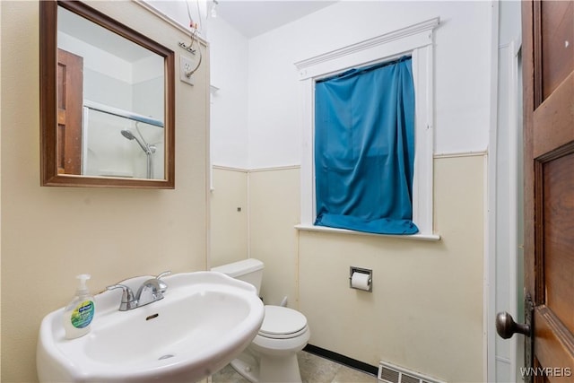 bathroom with toilet and sink