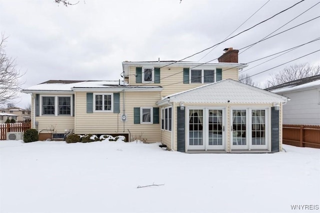 view of snow covered property