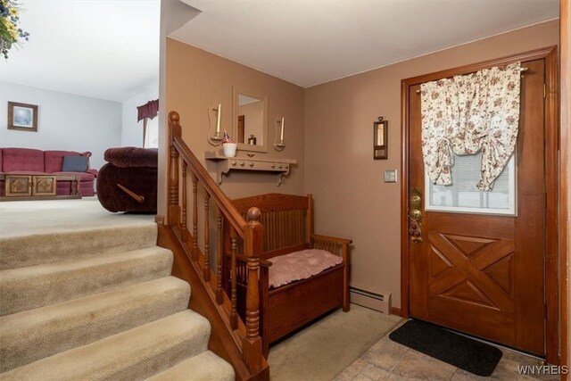 entryway featuring baseboard heating