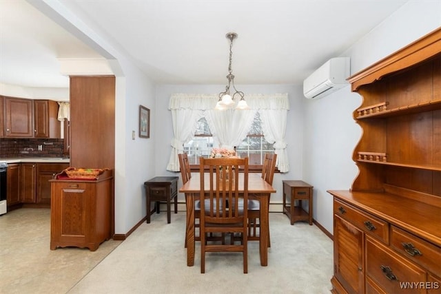 dining space featuring a wall mounted AC and an inviting chandelier