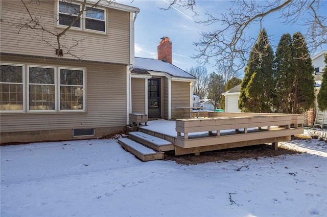 view of snow covered deck