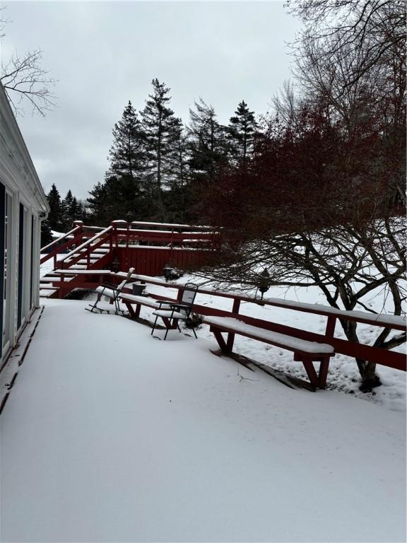 view of snow covered patio