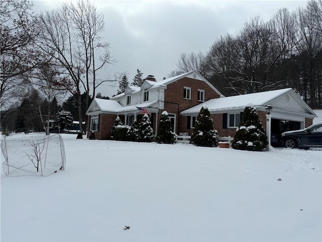 view of front of property featuring a garage