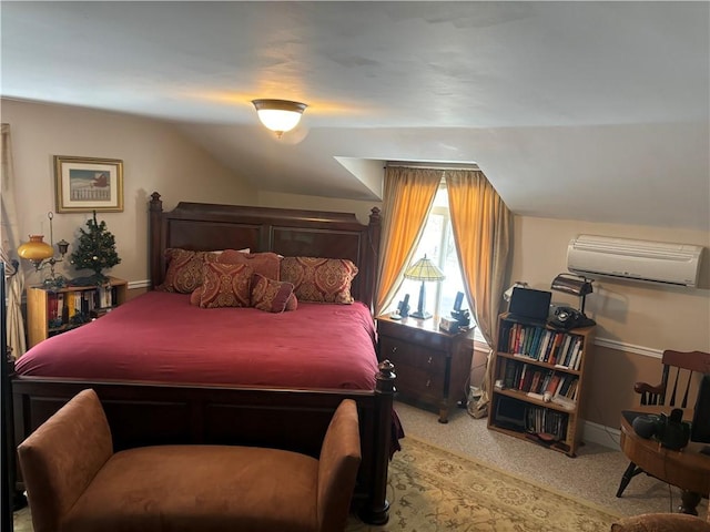 carpeted bedroom featuring vaulted ceiling and an AC wall unit