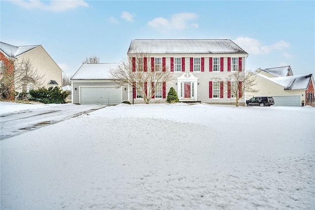 colonial-style house with a garage