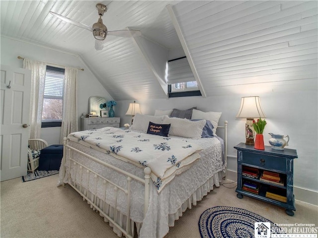 bedroom with lofted ceiling, ceiling fan, and carpet flooring