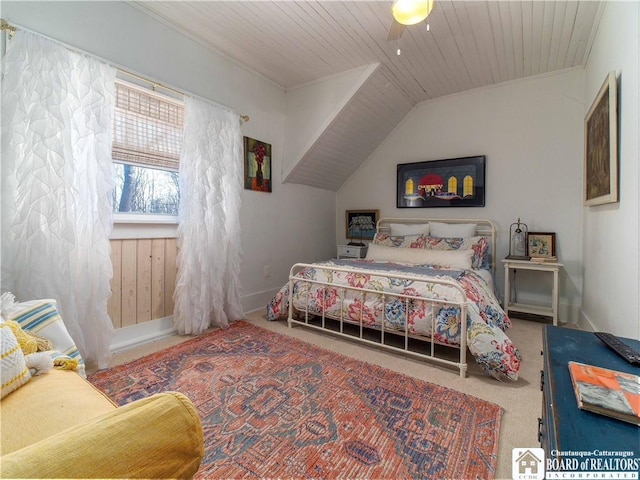 carpeted bedroom featuring wood ceiling, ceiling fan, and vaulted ceiling