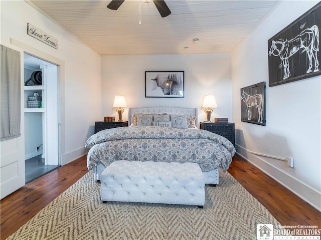 bedroom featuring ceiling fan, hardwood / wood-style floors, and wooden ceiling