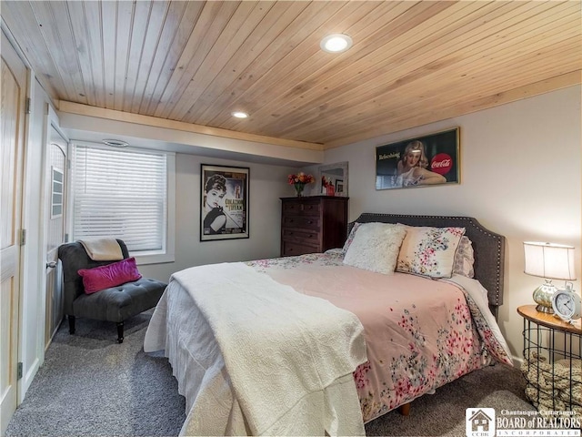 carpeted bedroom featuring wood ceiling