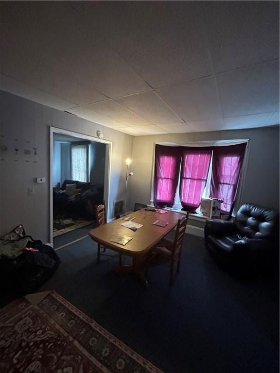 living room with plenty of natural light and carpet flooring