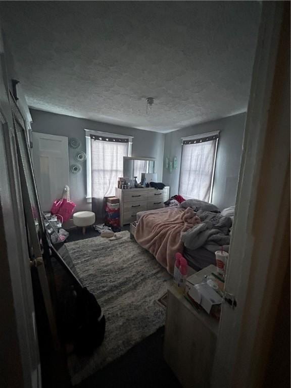 bedroom with a textured ceiling