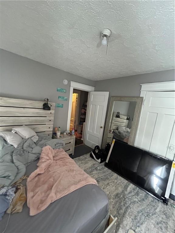 bedroom with a textured ceiling