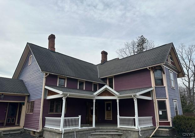401 S Main St, Nichols, NY 13812 - view of front of home with a chimney and a porch