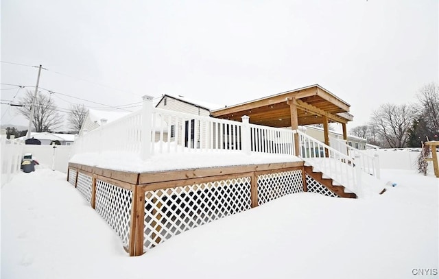 view of snow covered house