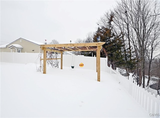 view of yard layered in snow