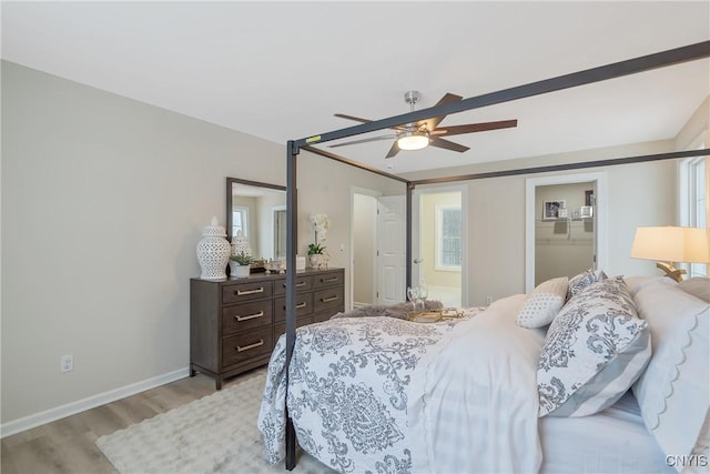 bedroom featuring ceiling fan and light hardwood / wood-style flooring